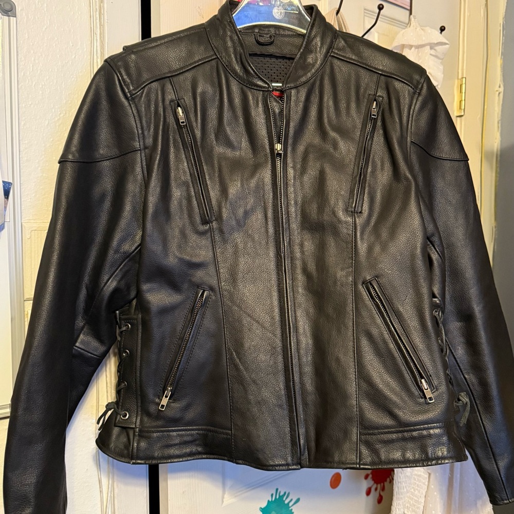 First Woman’s XL black leather original Harley Davidson jacket